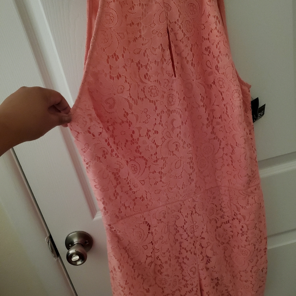 Women's coral lace romper.. NWT..New York and Com